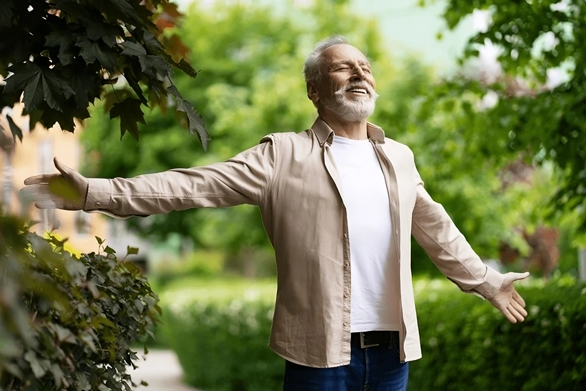 Person breathing fresh air surrounded by greenery